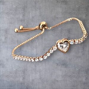 14K Rose GP tennis bracelet with large clear CZ heart Charm & adjustable size